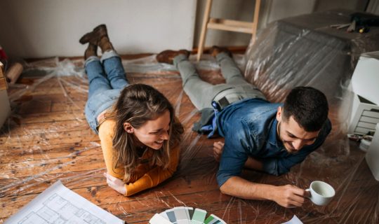Couple reviews paint colors and floor plan together