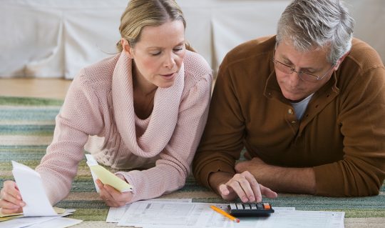 Couple uses calculator to prepare complete their tax documents